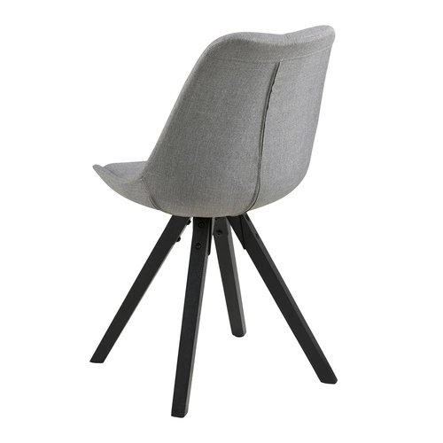 Krzesło Dima Actona tapicerowane szare skandynawskie z czarnymi drewnianymi nogami do jadalni