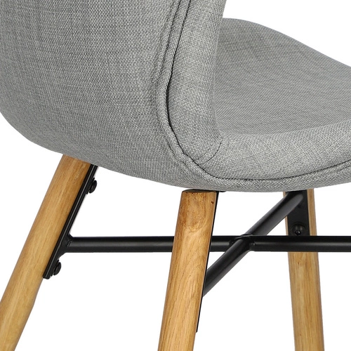 Krzesło tapicerowane Batilda Actona szare do jadalni nowoczesne z drewnianymi nogami