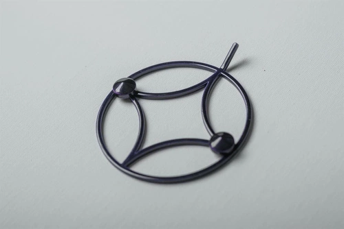 Holo XS nowoczesny czarny wieszak ścienny metalowy okrągły do przedpokoju POLYHEDRA