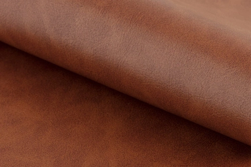 Krzesło tapicerowane obrotowe Dean Actona do jadalni brązowe ekoskóra loft na czarnych nogach