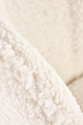 Krzesło do jadalni tapicerowane Leonore boucle kremowe ze złotymi nogami Intesi eleganckie