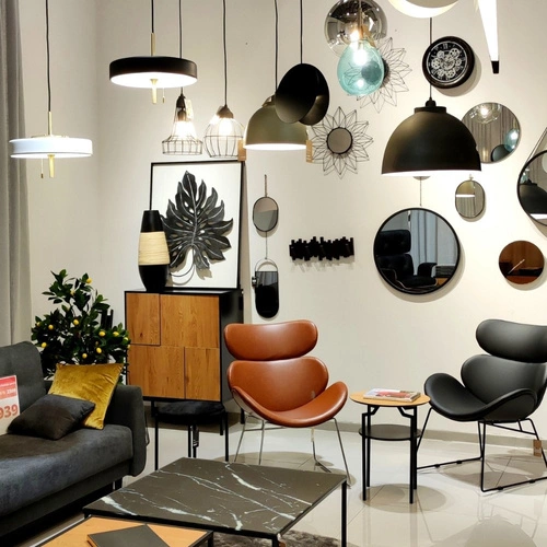 Fotel uszak Cazar szary nowoczesny na płozach tapicerowany do salonu Actona wypoczynkowy