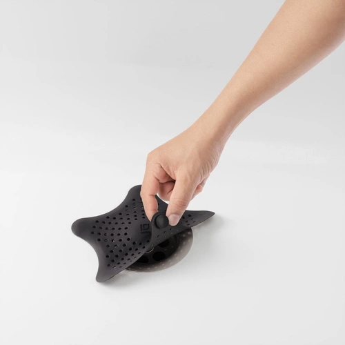 Sitko do zlewu Umbra Starfish czarne gumowe z przyssawkami do kuchni i łazienki 16 cm