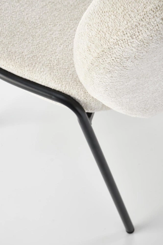 Krzesło tapicerowane Salome kremowe do jadalni nowoczesne skandynawskie z czarnymi nogami Intesi