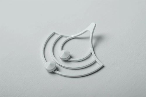 Nowoczesny biały wieszak ścienny metalowy Husk XS POLYHEDRA do przedpokoju lub garderoby