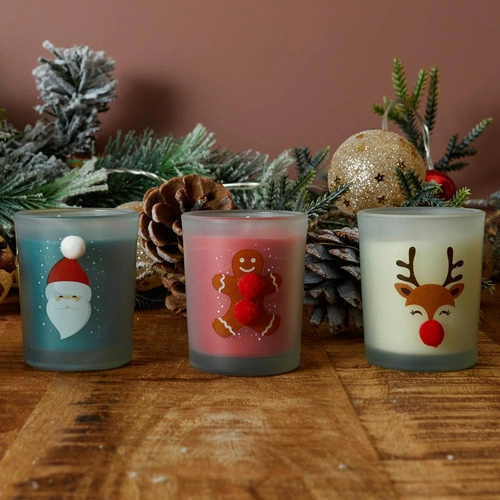 Świeca świąteczna zapachowa zielona z mikołajem w szkle Intesi dekoracyjna