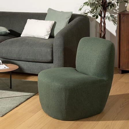 Fotel Leone nowoczesny tapicerowany zielony niski fotel do salonu Atmosphera wypoczynkowy