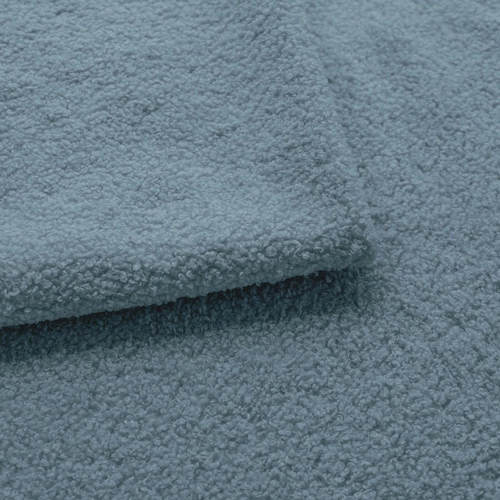 Narożnik z funkcją spania lewy Hobro niebieski nowoczesny do salonu z pojemnikiem