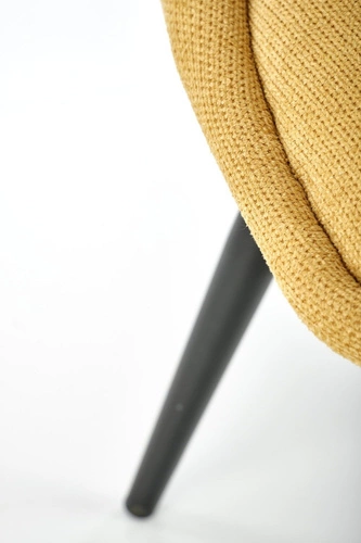 Krzesło tapicerowane Odile Intesi musztardowe do jadalni nowoczesne na czarnych nogach