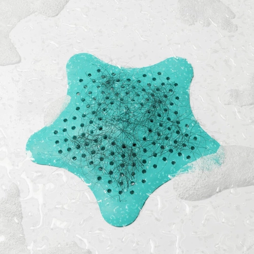 Sitko do zlewu i wanny Umbra Starfish turkusowe gumowe nowoczesne do łazienki 16 cm