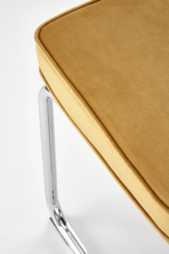 Krzesło tapicerowane Nelson Intesi welurowe musztardowe na płozach do jadalni nowoczesne