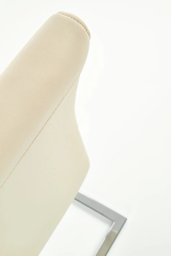 Krzesło tapicerowane Yvone kremowe ekoskóra na chromowanych płozach do jadalni i salonu Intesi