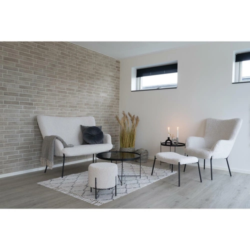 Fotel uszak Glasgow biały do salonu nowoczesny tapicerowany boucle z podłokietnikami Intesi