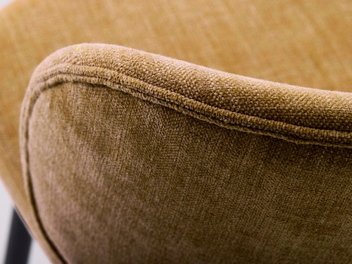 Krzesło tapicerowane Naws żółte nowoczesne do jadalni na czarnych metalowych nogach