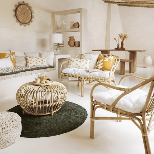 Fotel rattanowy Neta boho do salonu z podłokietnikami i poduszką Atmosphera naturalny