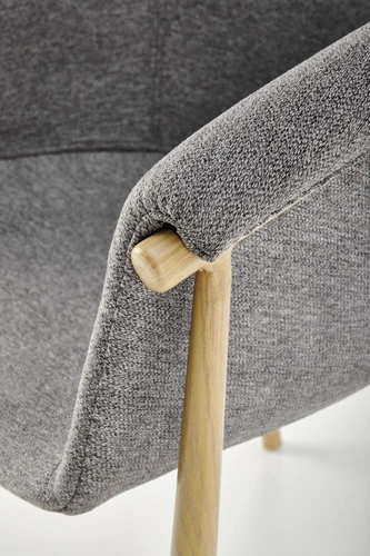 Krzesło tapicerowane Mathilde szare Intesi do jadalni nowoczesne z podłokietnikami skandynawskie