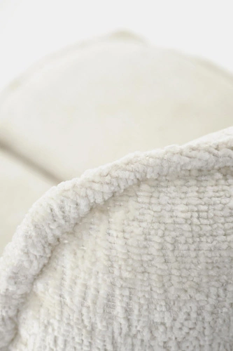 Fotel wypoczynkowy Florens kremowy obrotowy do salonu nowoczesny tkanina Intesi