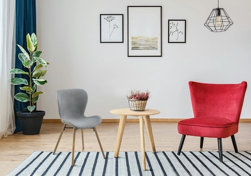 Krzesło tapicerowane Batilda Actona szare do jadalni nowoczesne z drewnianymi nogami