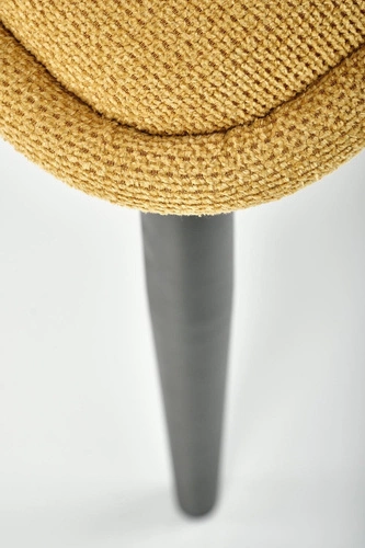 Krzesło tapicerowane Odile Intesi musztardowe do jadalni nowoczesne na czarnych nogach