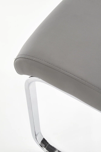 Krzesło tapicerowane Yvone szare ekoskóra na chromowanych płozach do jadalni Intesi