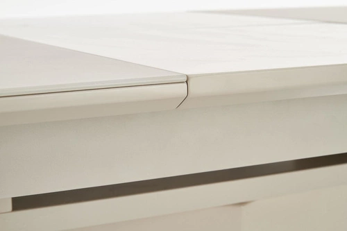 Stół rozkładany do jadalni Retos beżowy mat szklany blat nowoczesny na jednej nodze 140-180 cm