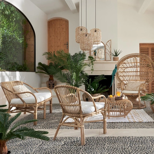 Fotel rattanowy Neta boho do salonu z podłokietnikami i poduszką Atmosphera naturalny