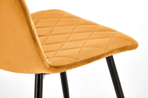Krzesło do jadalni Uferyn Intesi tapicerowane welur musztardowy nowoczesne pikowane czarne nogi