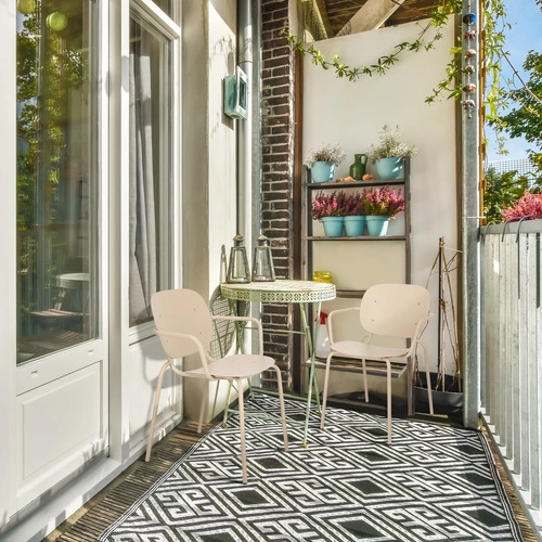 Krzesło metalowe Si-Si Arm SCAB Design beżowe z podłokietnikami do ogrodu i tarasu