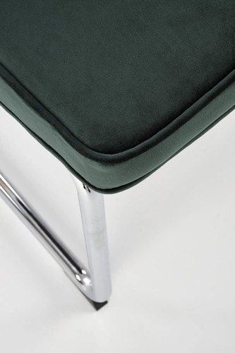 Krzesło tapicerowane welurowe Nelson Intesi zielone glamour na płozach do jadalni i salonu
