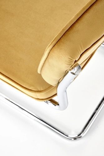 Krzesło tapicerowane Nelson Intesi welurowe musztardowe na płozach do jadalni nowoczesne