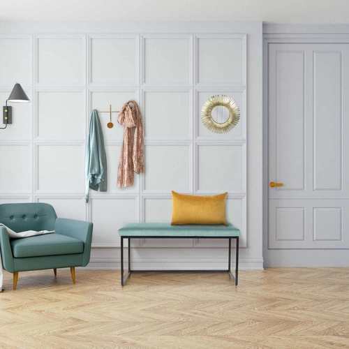 Ławka tapicerowana Donore niebieska glamour do przedpokoju welurowa na czarnych nogach