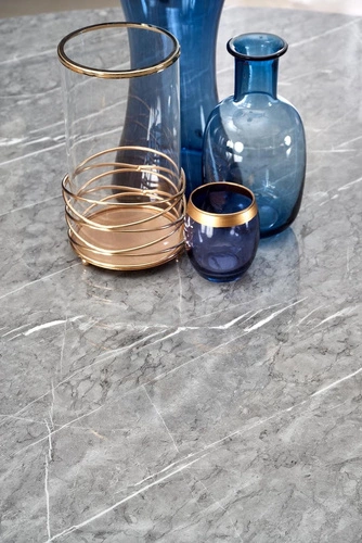 Stół okrągły do jadalni Misto 140 cm szary marmur nowoczesny na czarnych nogach Intesi