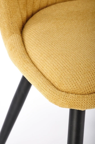 Krzesło tapicerowane Odile Intesi musztardowe do jadalni nowoczesne na czarnych nogach