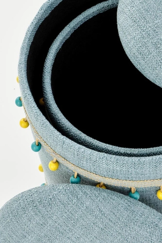 Zestaw 2 niebieskich puf Eblis ze schowkiem okrągłe tapicerowane do salonu i pokoju dziecięcego