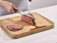 Deska bambusowa do krojenia Joseph Joseph Cut&Carve dwustronna z rantem beżowa