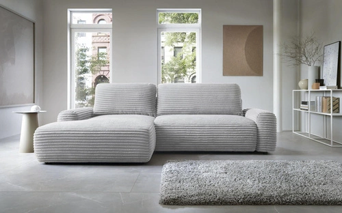 Narożnik z funkcją spania lewy sztruksowy Domle szary jasny do salonu z pojemnikiem