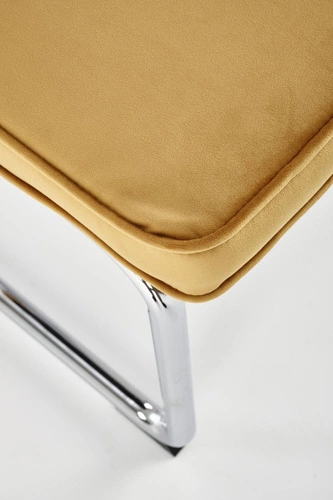 Krzesło tapicerowane Nelson Intesi welurowe musztardowe na płozach do jadalni nowoczesne