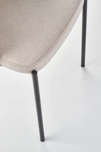 Krzesło tapicerowane Humber beżowe do jadalni i salonu nowoczesne na czarnych metalowych nogach