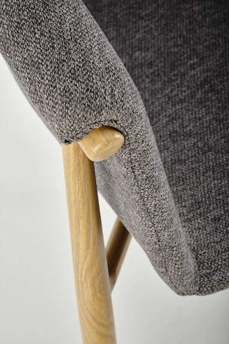 Krzesło tapicerowane Mathilde szare Intesi do jadalni nowoczesne z podłokietnikami skandynawskie