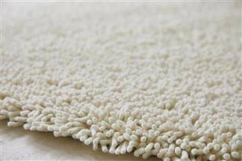 Dywan shaggy do salonu Shaggy Gravel Woolwhite 140x200 cm wełniany biały nowoczesny Carpets&More