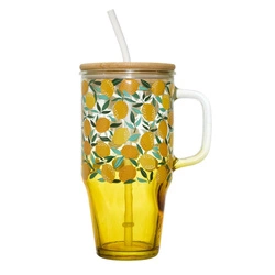 Kubek szklany Soleo Intesi 650ml z pokrywką i słomką żółty do napojów letnich